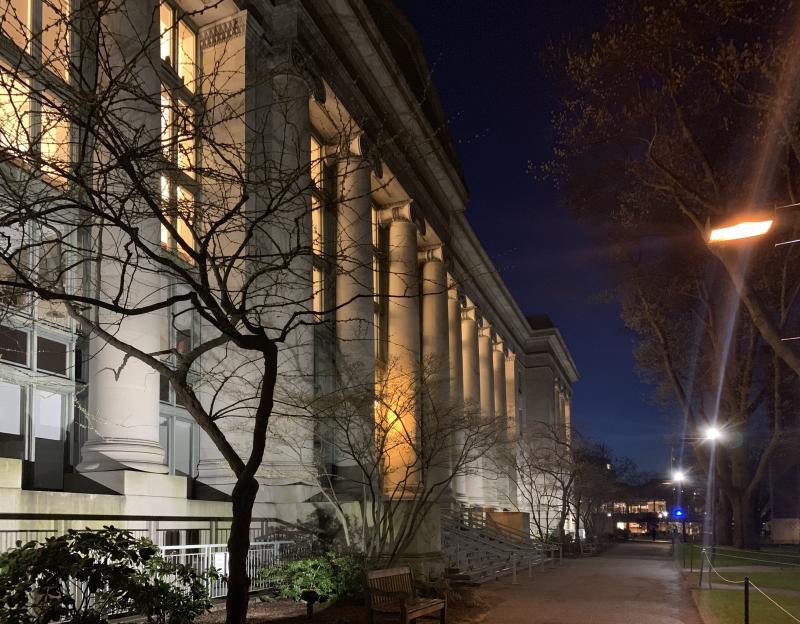 The Harvard Law School building at night