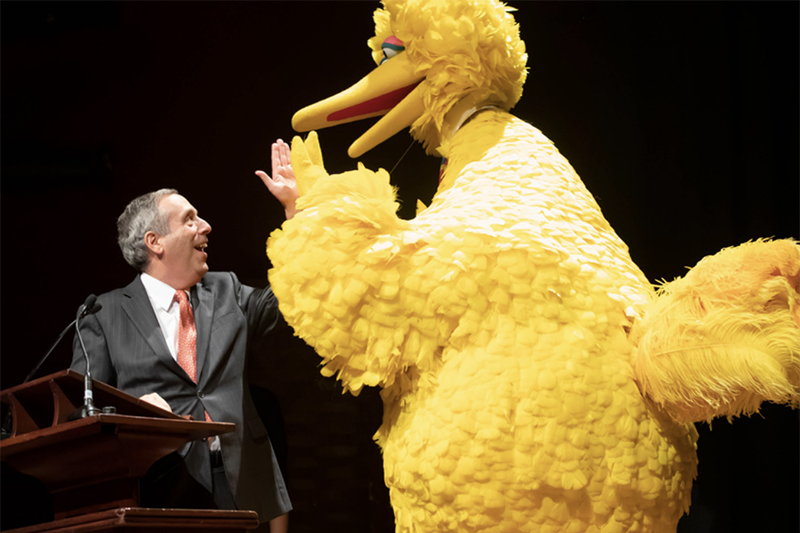 President Larry Bacow and Big Bird