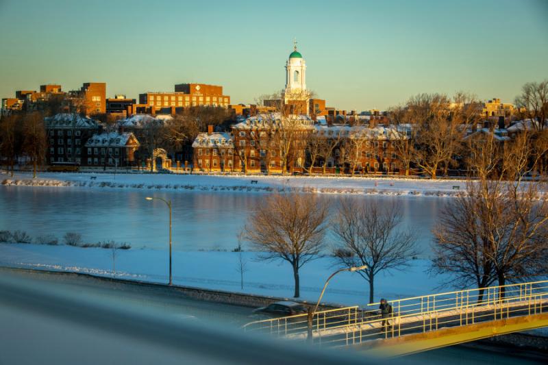 A view of the Charles River and Leverett House during the winter season.