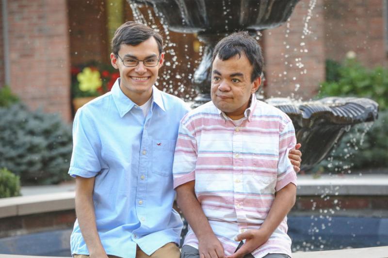Harvard graduate Nathan Grant and his twin brother, Nik, who has Hunter syndrome.