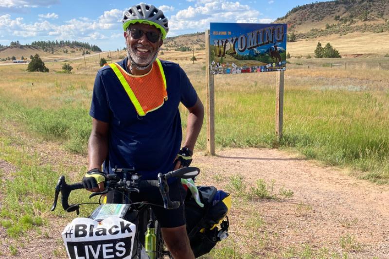 Professor Scott Edwards enters Wyoming on his bike.