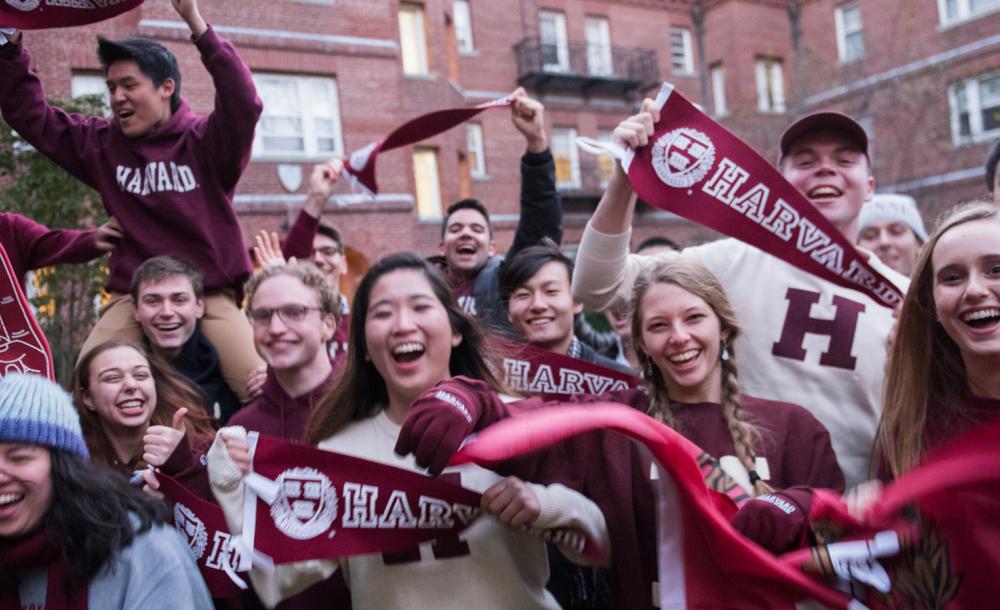 Students with Harvard gear 