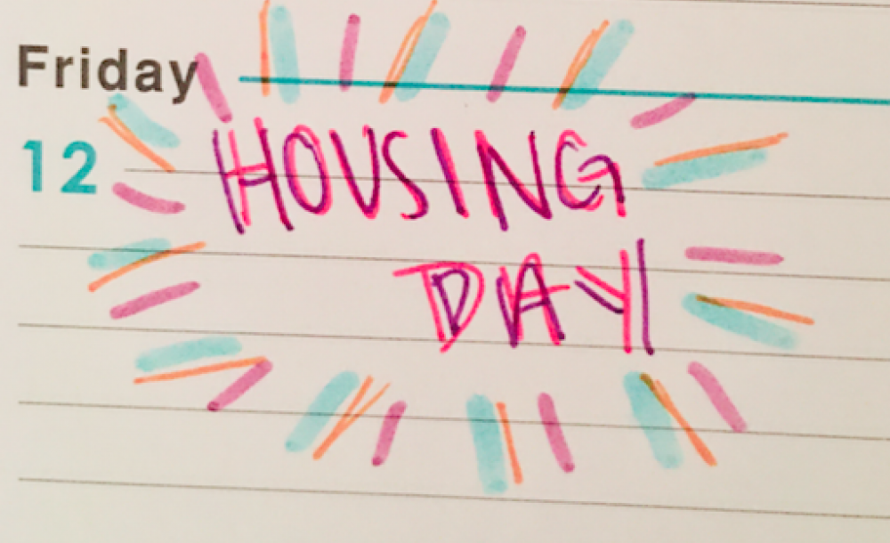 I wrote 'Housing Day' on my agenda's calendar.