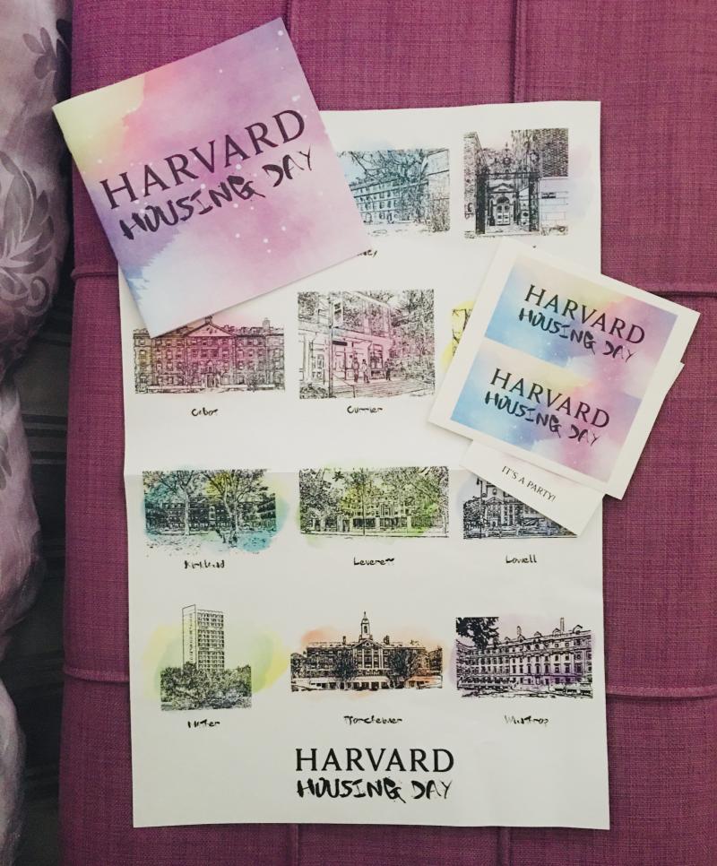 The contents from my Housing Day package: a watercolor poster of all the 12 houses, some stickers, and a booklet detailing the history, traditions, and a welcome from each house