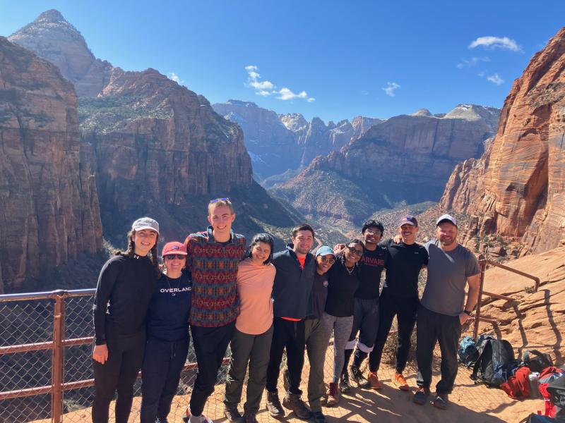 Image of FOP Steering Committee '23 posing for a picture and smiling at Zion National Park!