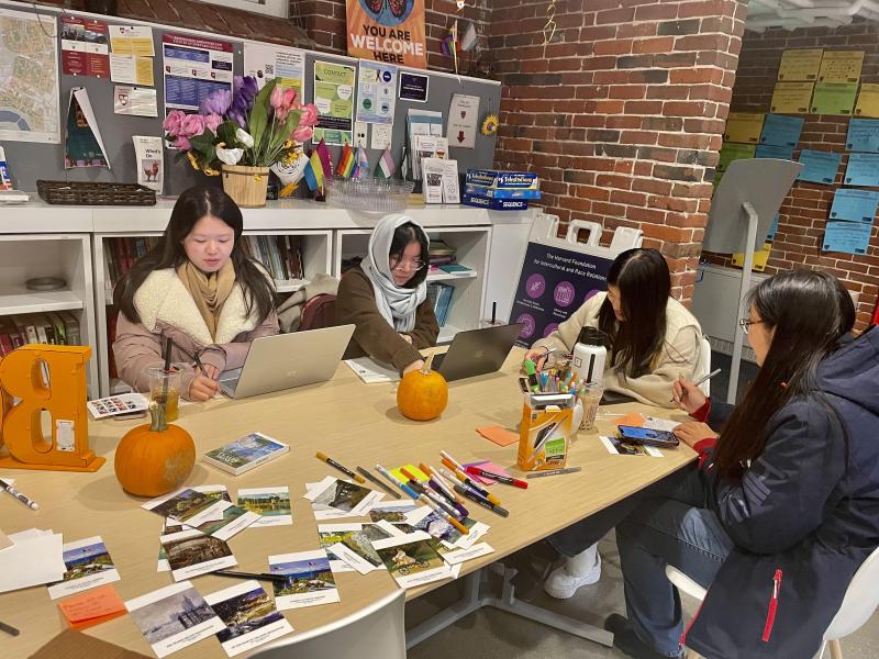 Students gather while writing thank you cards and sipping on bubble tea!