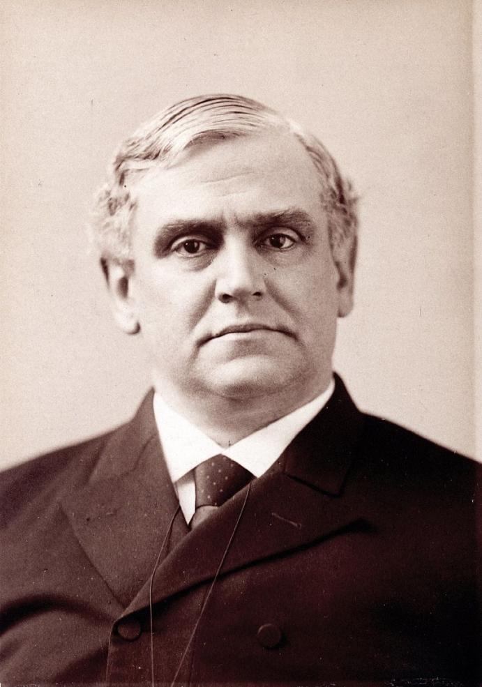 Portrait image of Phillips Brooks looking toward the reader.