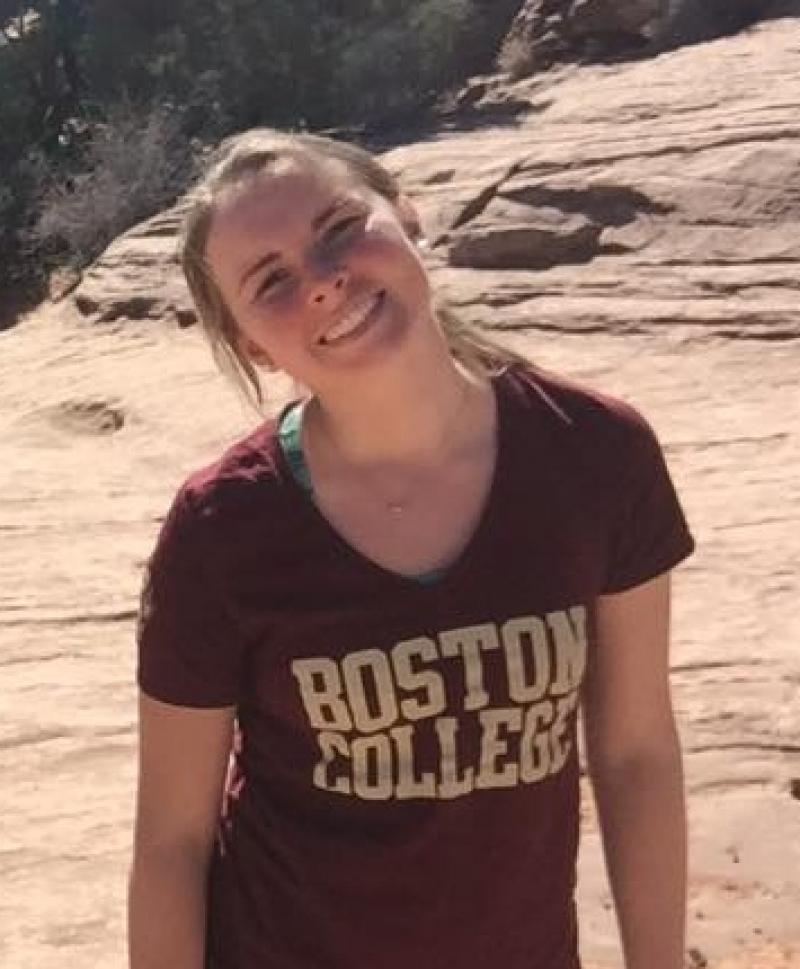 student wearing a Boston College shirt