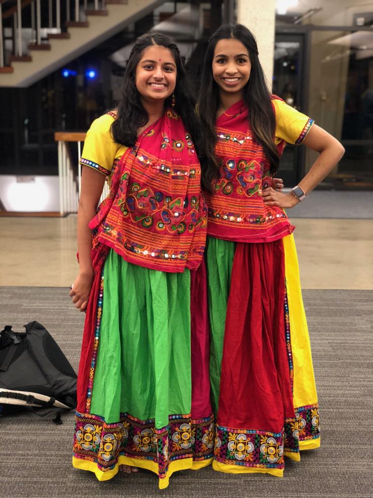 Author with friend while wearing raas costumes