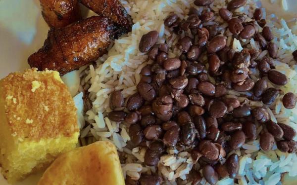 Rice and Beans, plantains, corn bread, and Brazilian cheese bread from Oliveira's Steakhouse.