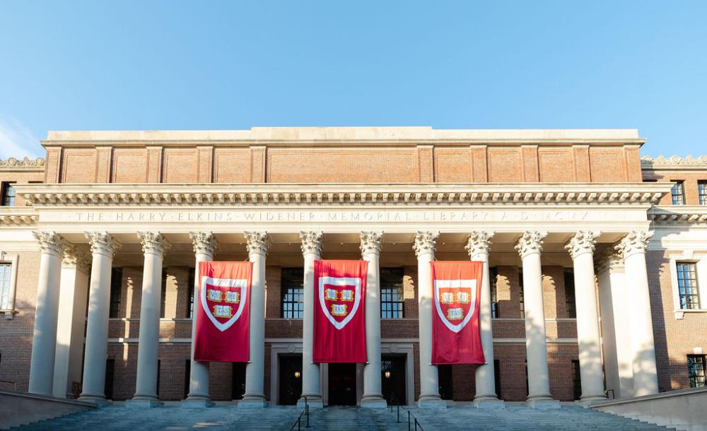 Harvard banners hanging from Widener Library
