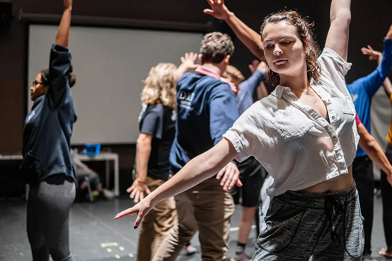Emmaline Cook '20, who plays Graziella, rehearses choreography with the cast