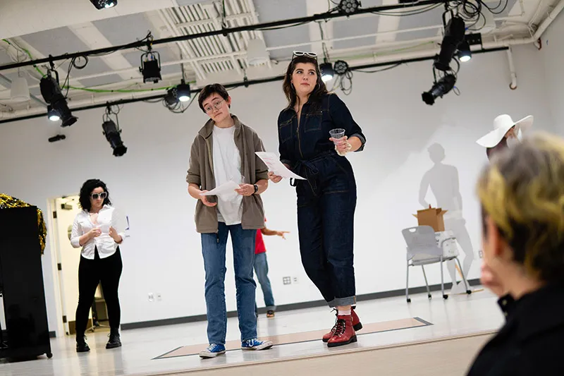 Amanda Gonzalez-Piloto ’21, Isaac Heller ’23, and Elle Shaheen ’21 kick off the first number during the rehearsal