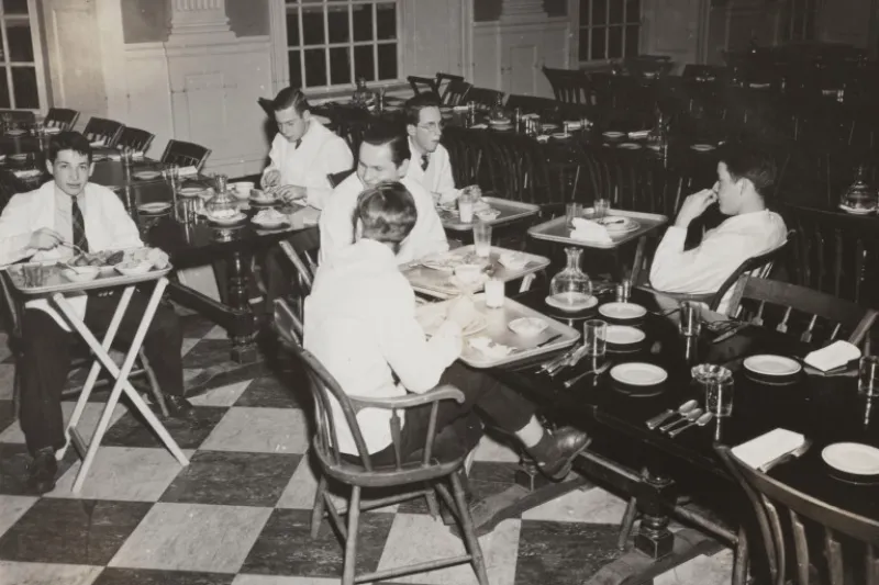 In this 1943 photo, student waiters are shown in the Lowell House dining room.