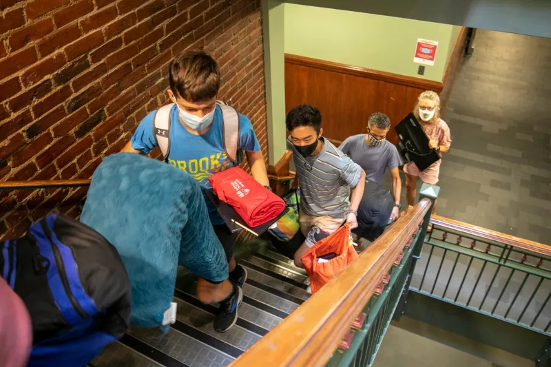 Keegan Harkavy ’25 (from left) leads the way. Matt Tengtrakool ’25 is followed by Harkavy’s parents, Brad Harkavy and Ann Marie Mador.