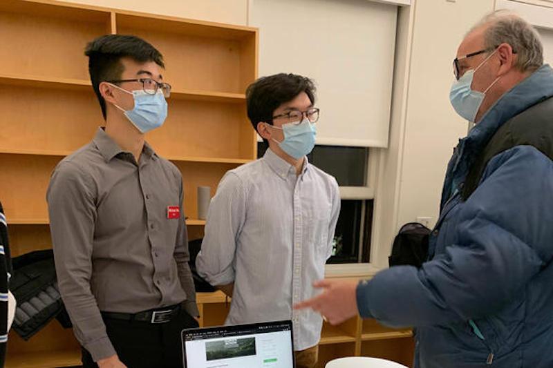 Michael Wu (left), '22, and Benjamin Chang, '24, present Rem, a peer-to-peer fundraising app.