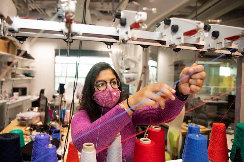 Kausalya Mahadevan, a Ph.D. candidate in mechanic engineering and materials science, designs knit fabrics with unusual mechanical behaviors, such as multistability, for use in wearable devices and functional garments. 