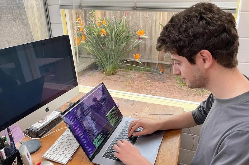 Avi Schiffmann works on the website UkraineTakeShelter, created with fellow Harvard student Marco Burstein. The website helps Ukrainian refugees connect with host families.