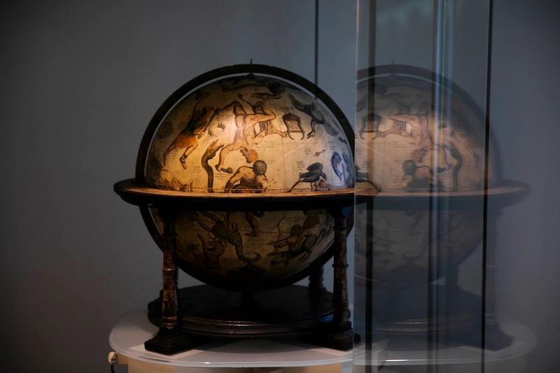 Mercator celestial globe from mid-1500s resides in the Pusey Library hallway gallery, outside the Map Collection, along with its terrestrial companion.
