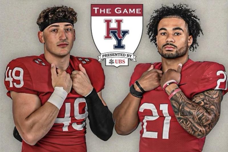 Two Crimson football players on Harvard Yale poster