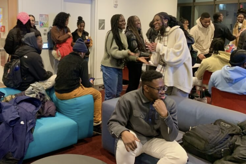 Members of the Harvard Society of Black Scientists and Engineers gather for their Spring Kickoff event at the Smith Campus Center