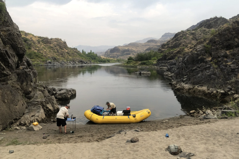 Elijah McGill ’24 navigating the Pacific Northwest’s Snake River in raft with fellow rangers.