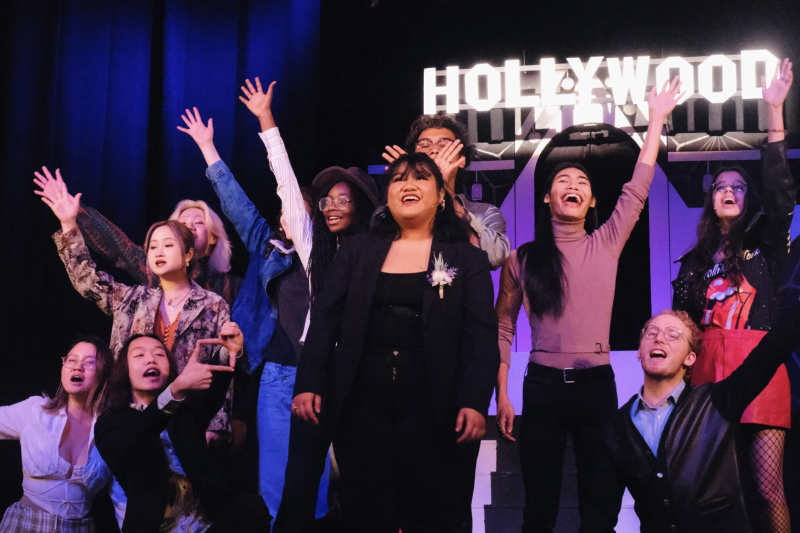 Singers onstage from "ISCARIOT," which reimagines Judas as a queer Asian American teenager attending a posh Los Angeles high school.