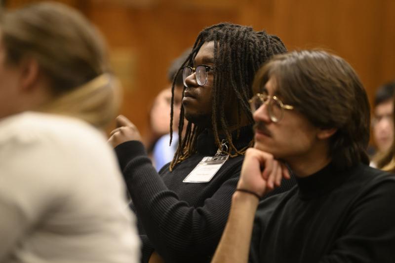 Summit participants listening to Keith Whittington’s remarks.