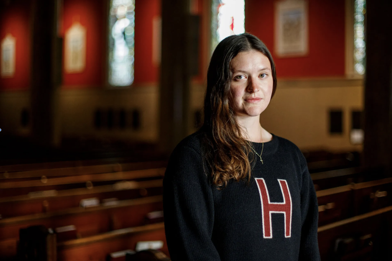 Faith Schmidt ’25 inside St. Paul’s Parish in Harvard Square.