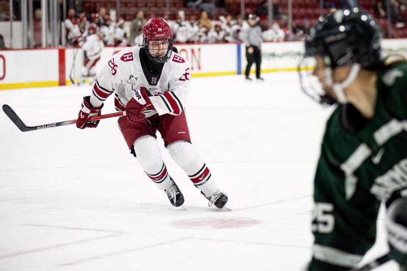 Gabi Davidson Adams in Hockey Gear skating during a hockey game