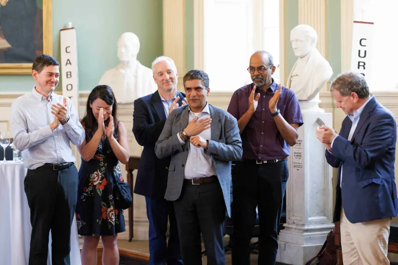 Rakesh Khurana receives warm applause at a celebration of his time as Danoff Dean of Harvard College