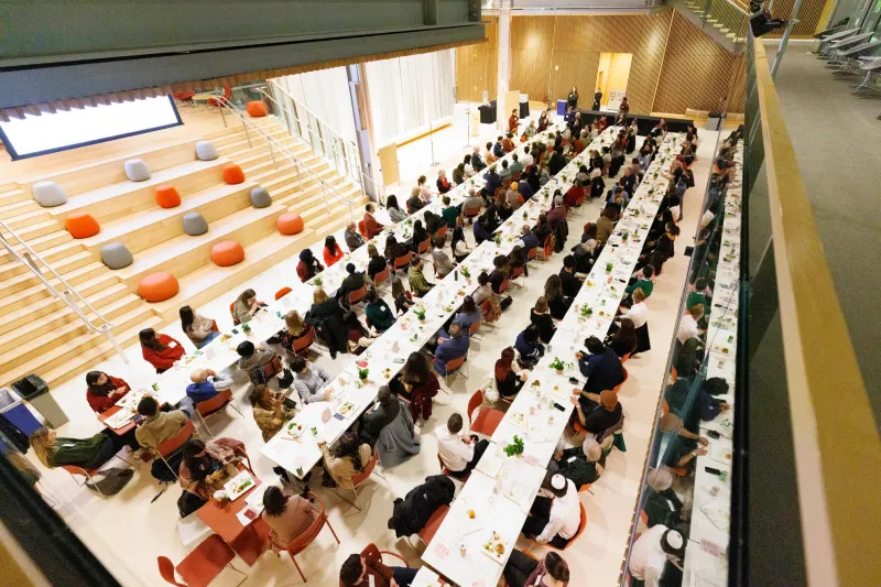 Rows of seats of students and faculty in the Science Center during the dinner.