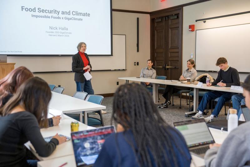 Professor Lene Hau teaching in front of a class.
