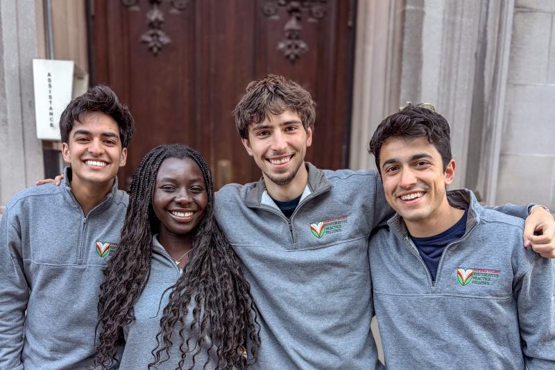 Four members of the Restorative Practice Fellows. From left to right: Zain Memon ’28, Winifred Ofori-Manu ’27, Jamie Durant ’26, and Nayan Sapers ’26.