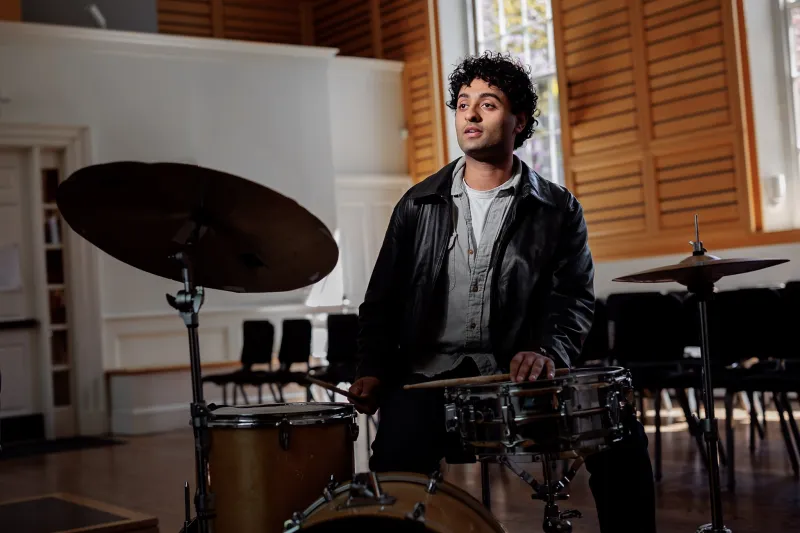 Raghav Mehrotra ’26 sitting at his drumset.