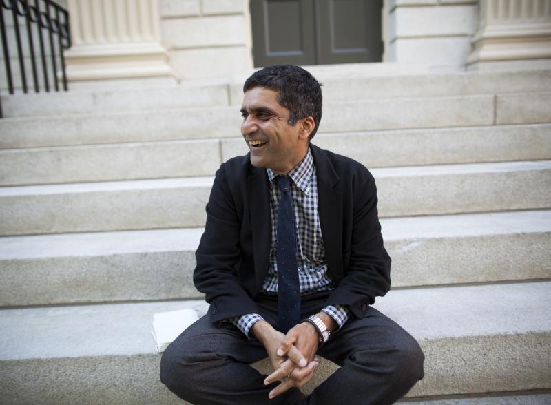 Danoff Dean of Harvard College, Rakesh Khurana, on the steps of University Hall