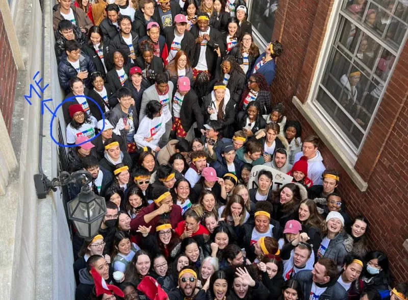 Students crowding in front of Adams house