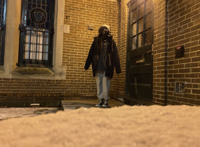 Student standing in snow