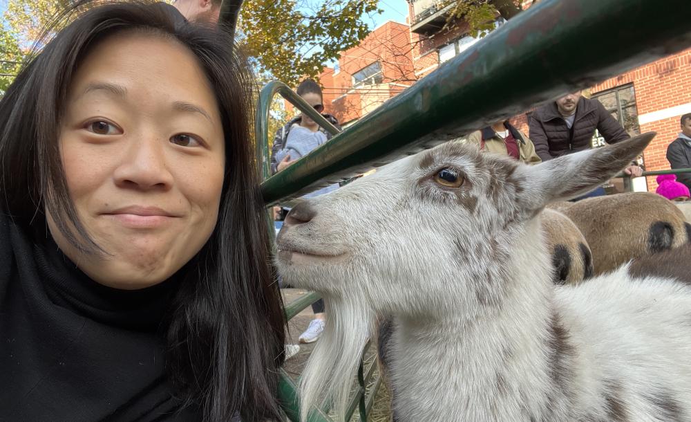 Headshot of Justine '06 with a goat