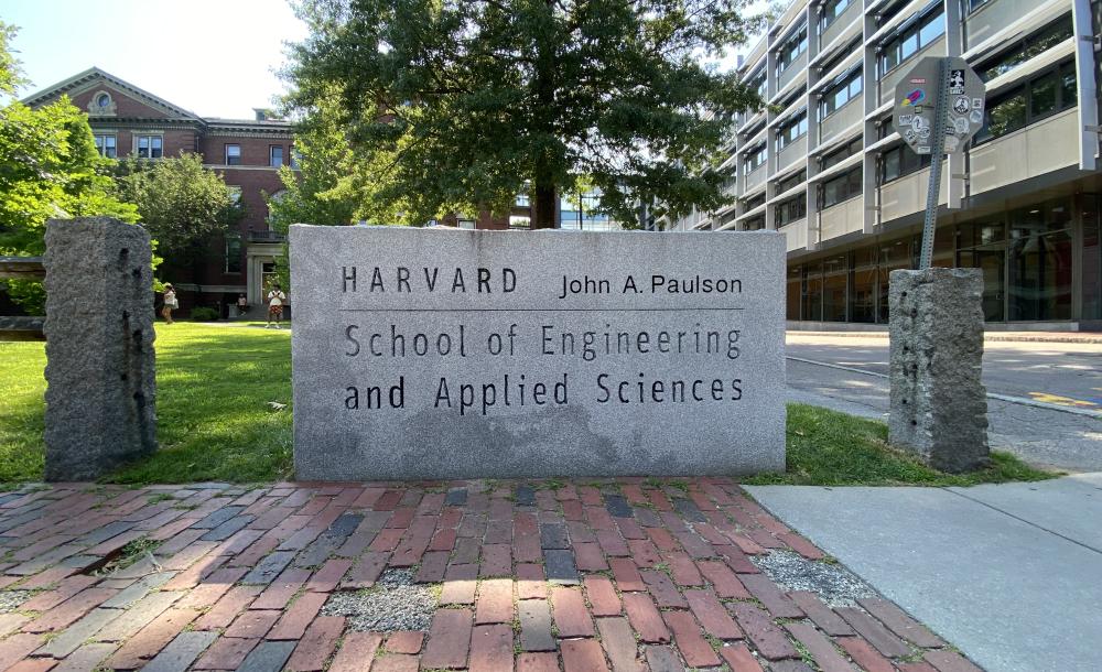 An image of the Harvard John A. Paulson School of Engineering and Applied Sciences sign in front of Pierce Hall. 