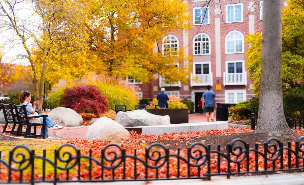 adams house courtyard with fall leaves in the background