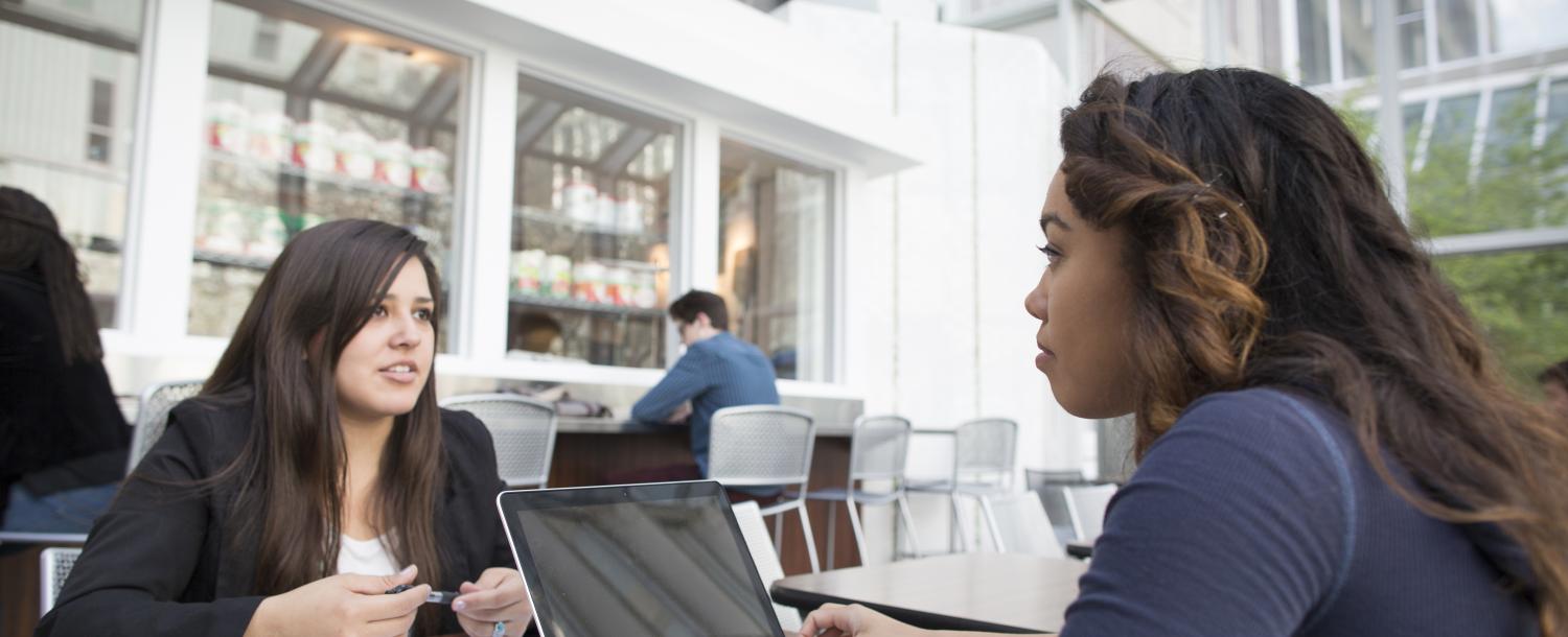 student and advisor talking to each other
