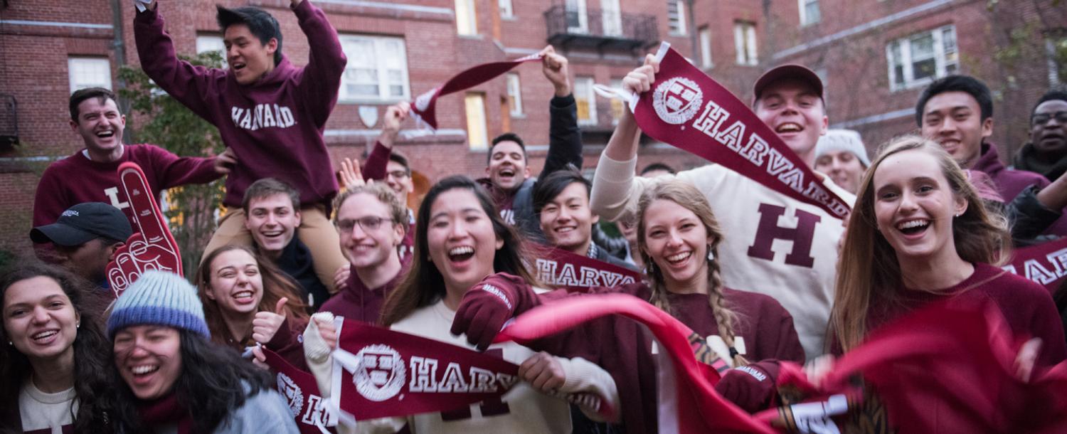 Students with Harvard gear 