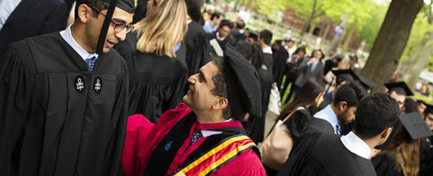 Dean of the College and student during Commencement
