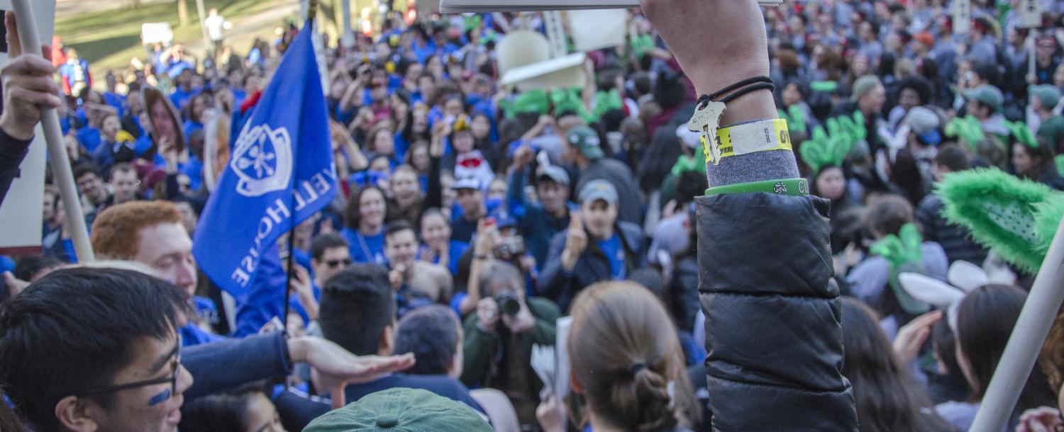 Students gathered outside Widener Library celebrating Housing Day
