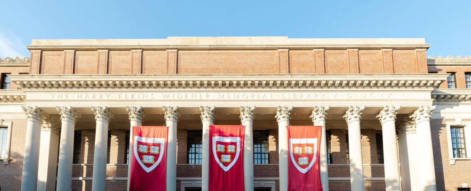 Harvard banners hanging from Widener Library