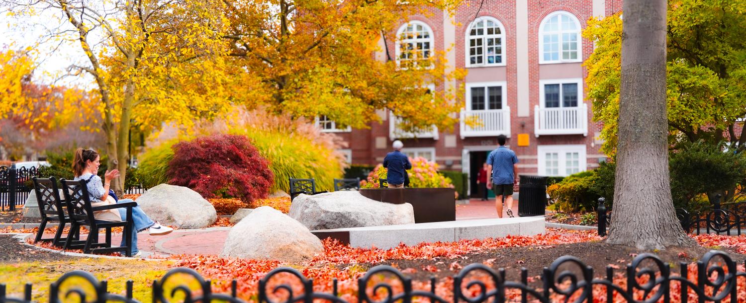 adams house courtyard with fall leaves in the background