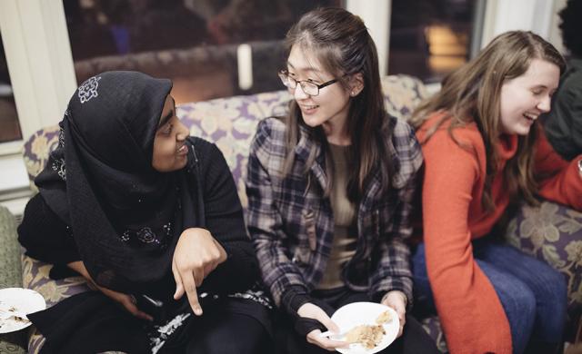 3 female students laughing