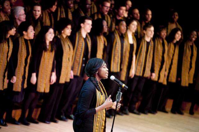 Harvard Kuumba singers performing on stage