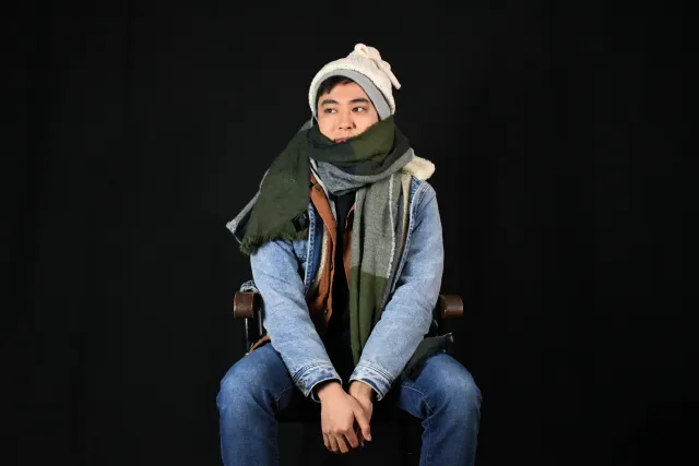 Person wearing many layers of clothing